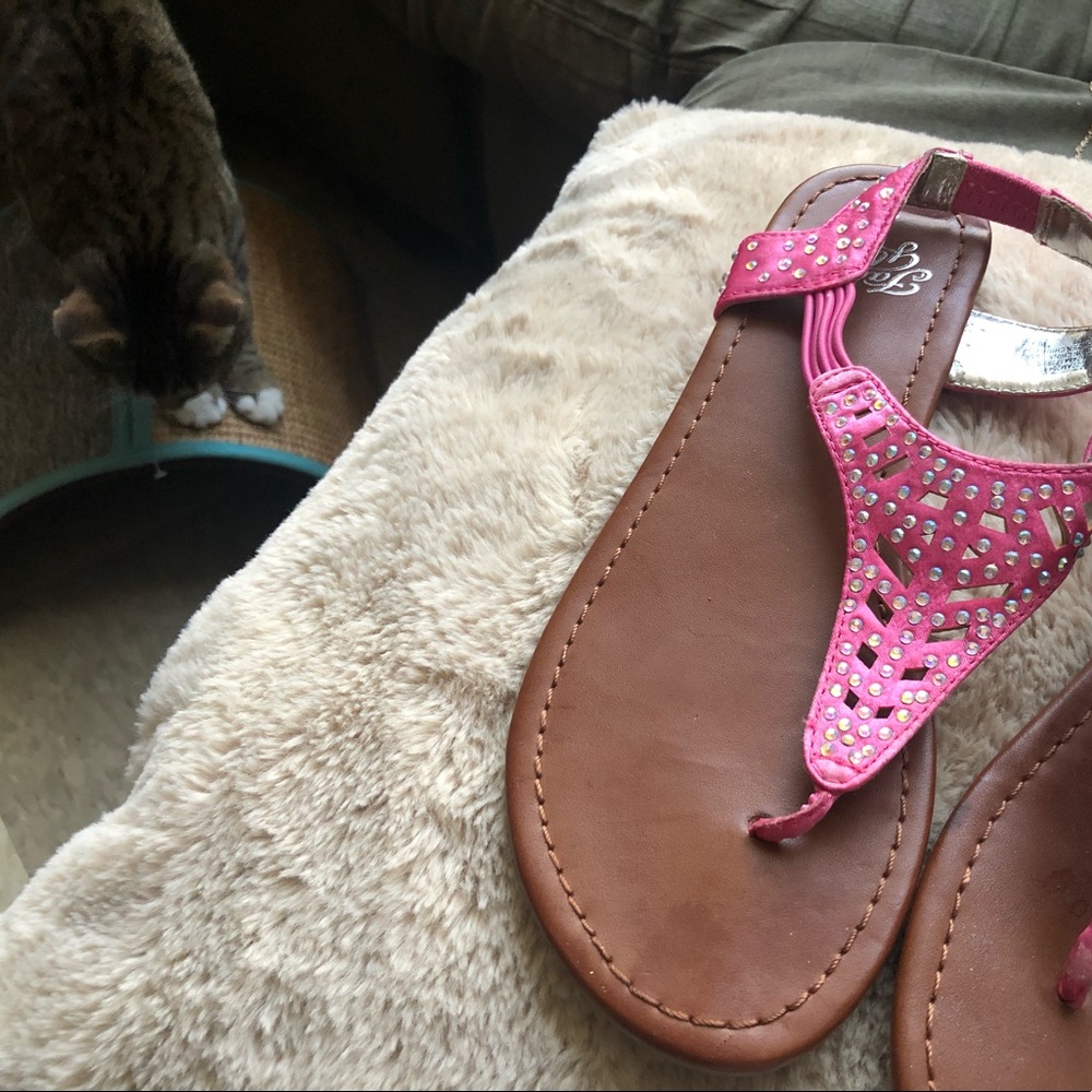 Pretty sandals. They are Neon pink (And Used).